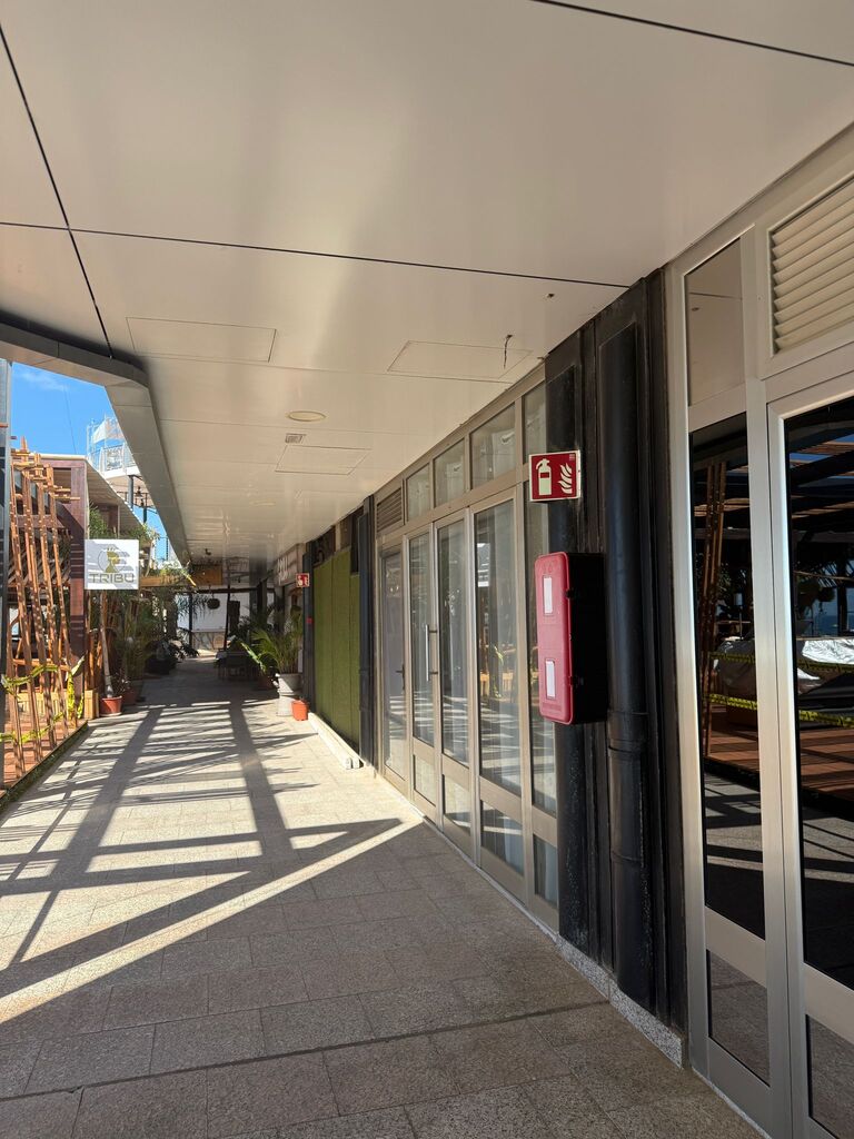 The covered walkway that leads to the club entrance.