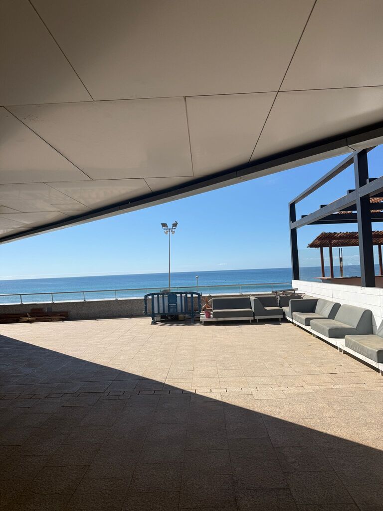 The covered terrace looking out over the seafront to the Atlantic.
